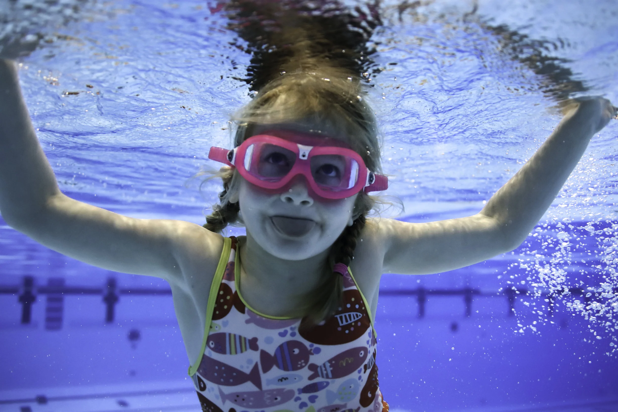 Evie swimming in the deep end of the Shaw centre.