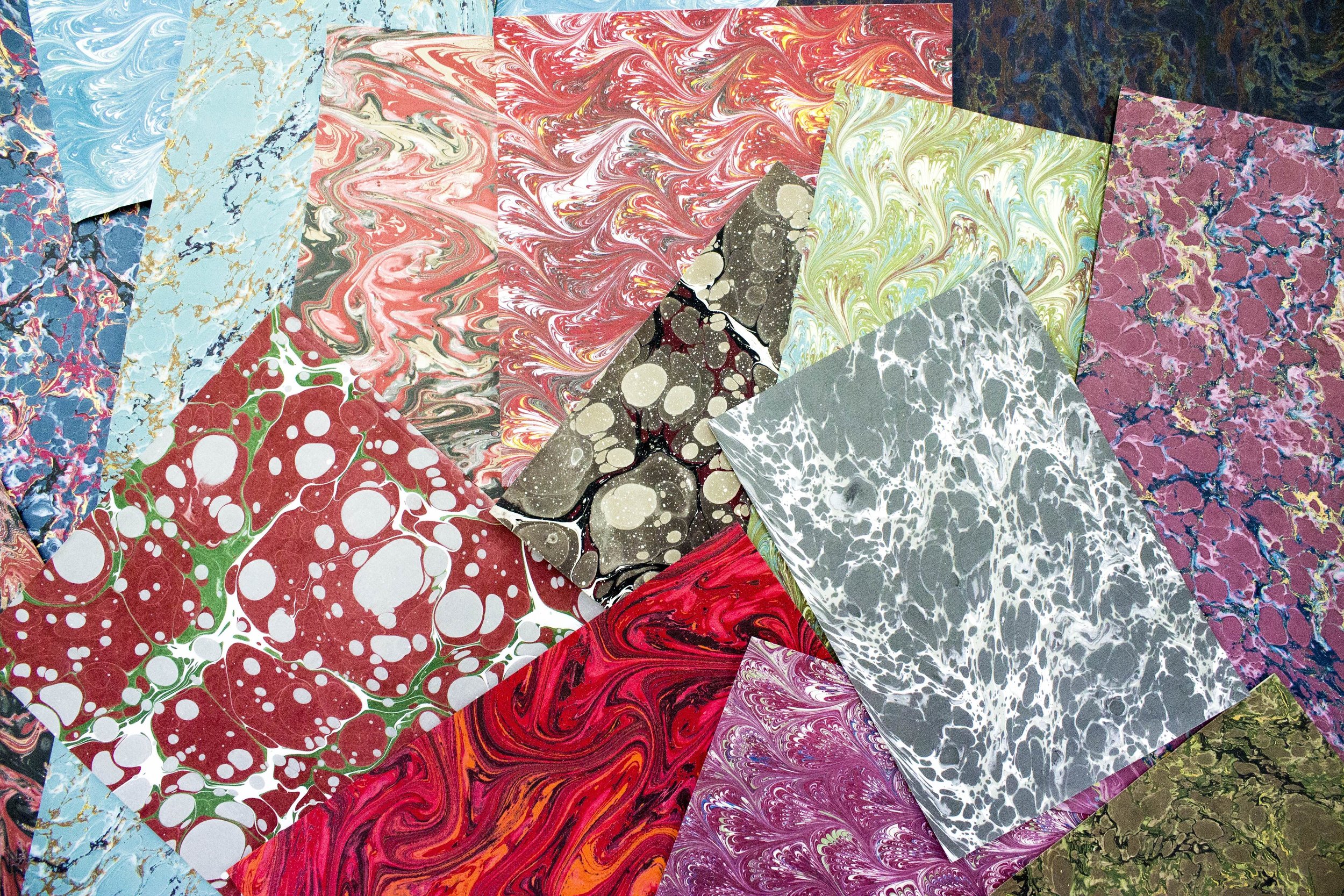 We stocka range of had and machine marbled papers. Contact us to see what we have available.