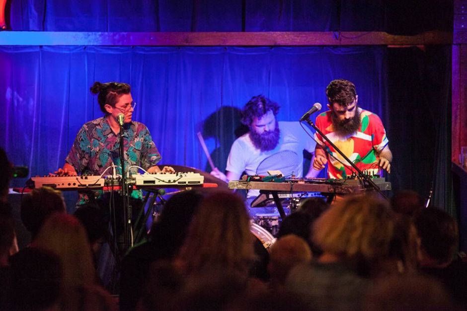 The Phoenix show how they use different interfaces within their music. Photo: Adam Thomas / ABC