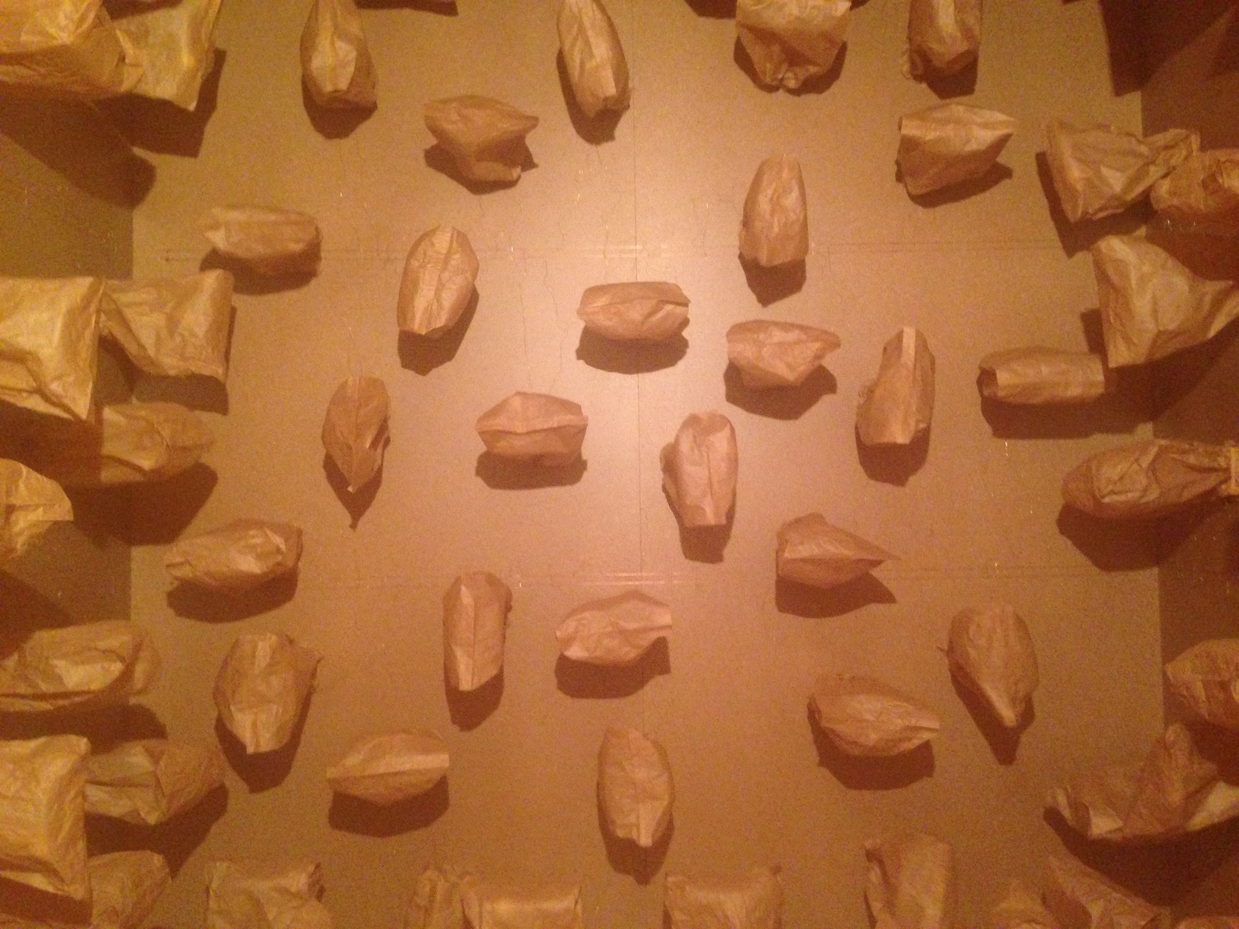 Zimoun, 317 prepared dc-motors, paper bags, shipping container, 2016