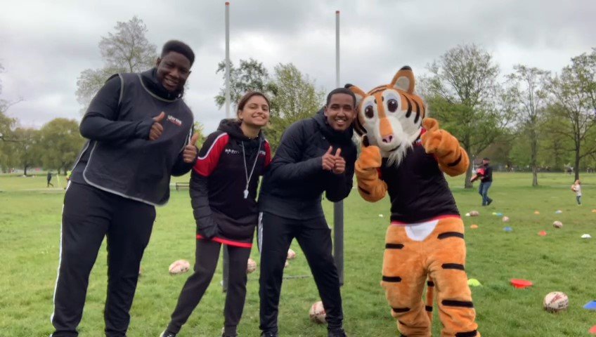 Tiger w Clapham team.jpg