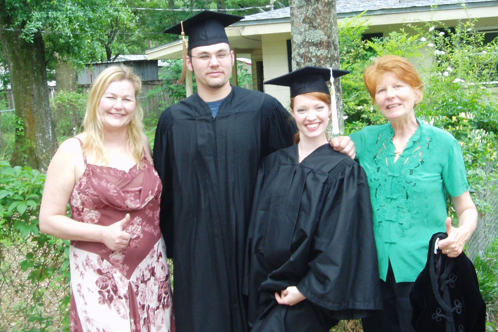 My graduation from college, 2005. (Left to Right: Mother-in-Law, Husband, Me, Mom)