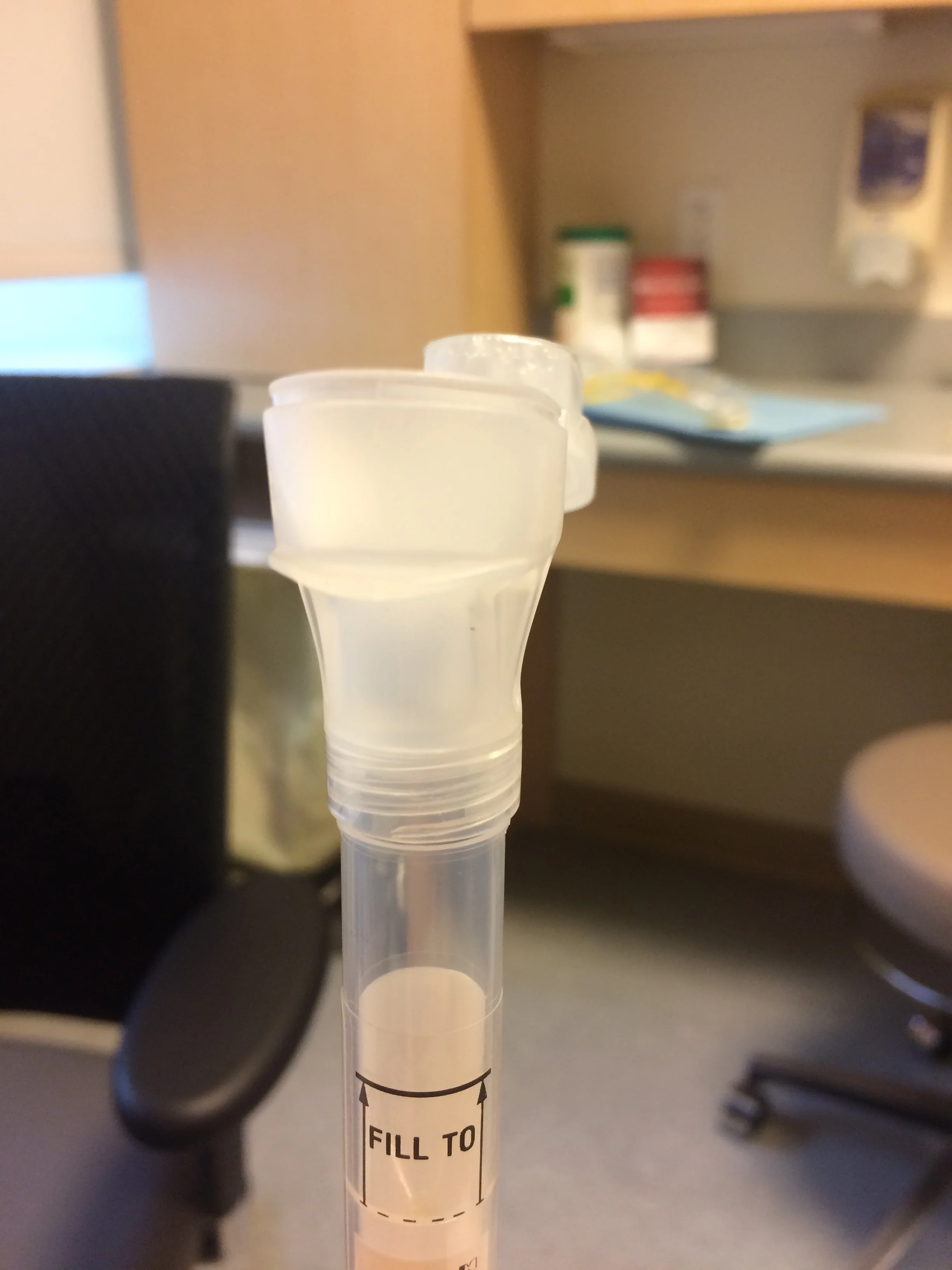 Getting genetic testing requires a lot of spitting in a tube!