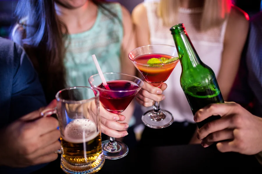 bigstock-Group-of-friends-toasting-cock-169489202.jpg