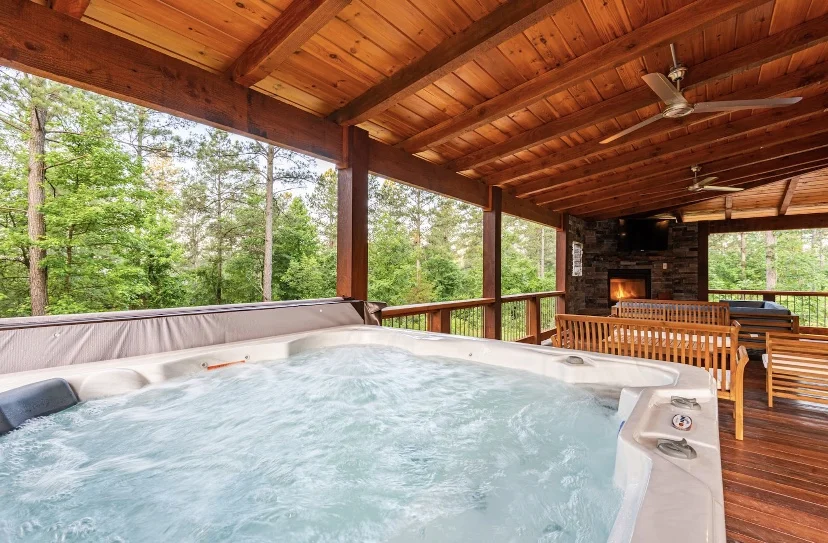 Soak in the hot tub while enjoying nature.