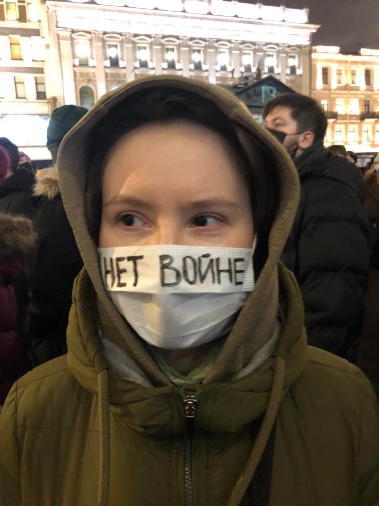  Original caption: ‘No to war’ reads this protester’s mask. [ Article. ]  Niko Vorobyov/Al Jazeera  