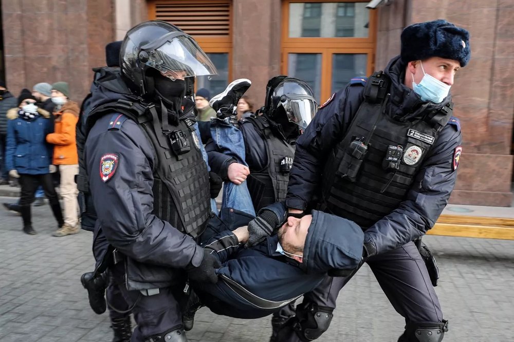  Protestor arrested for having sign with only asterisks on it.   Epsilon/Getty Images Europe  