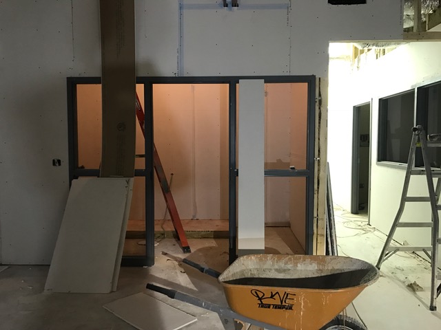 These are the frames for the windows and door to the ICU. This is directly off of our main treatment room, so we can keep an eye on every pet at all times while they are recovering from surgery. To the right, you can see the windows to the surgical suite.
