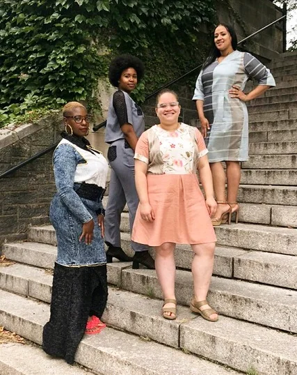 Eileen and her Sew Sisters, September 2018 graduating class at Custom Collaborative’s Training Institute, wearing their final looks designed and made by them using upcycled materials.