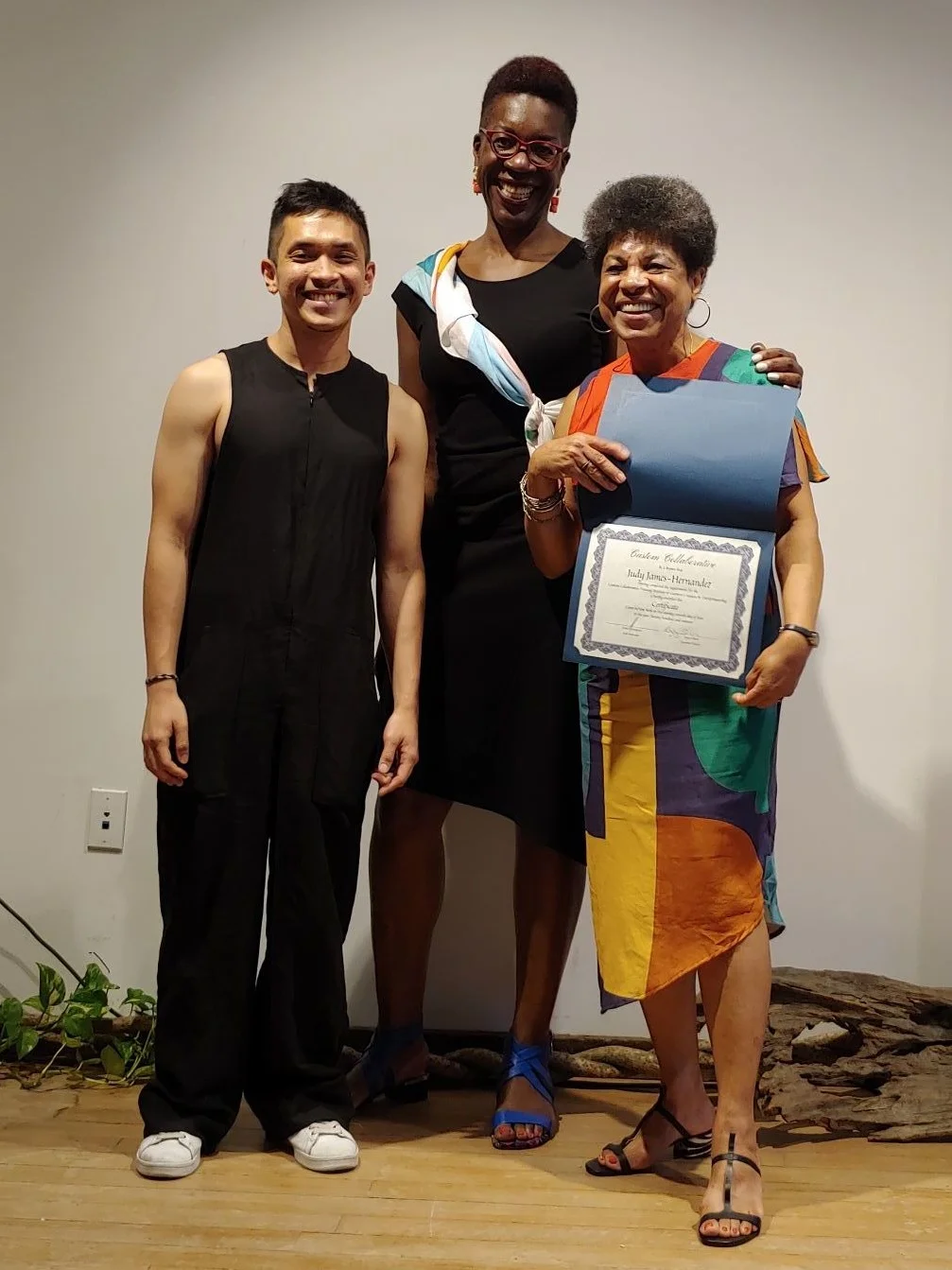 Graduate Judy James-Hernandez receives her certificate in garment construction and entrepreneurship from Lead Instructor Daniel Concepcion and Executive Director Ngozi Okaro. Training Institute Cohort 6 Graduation Celebration & Fashion Show June 27, 2019 at Mara Hoffman.