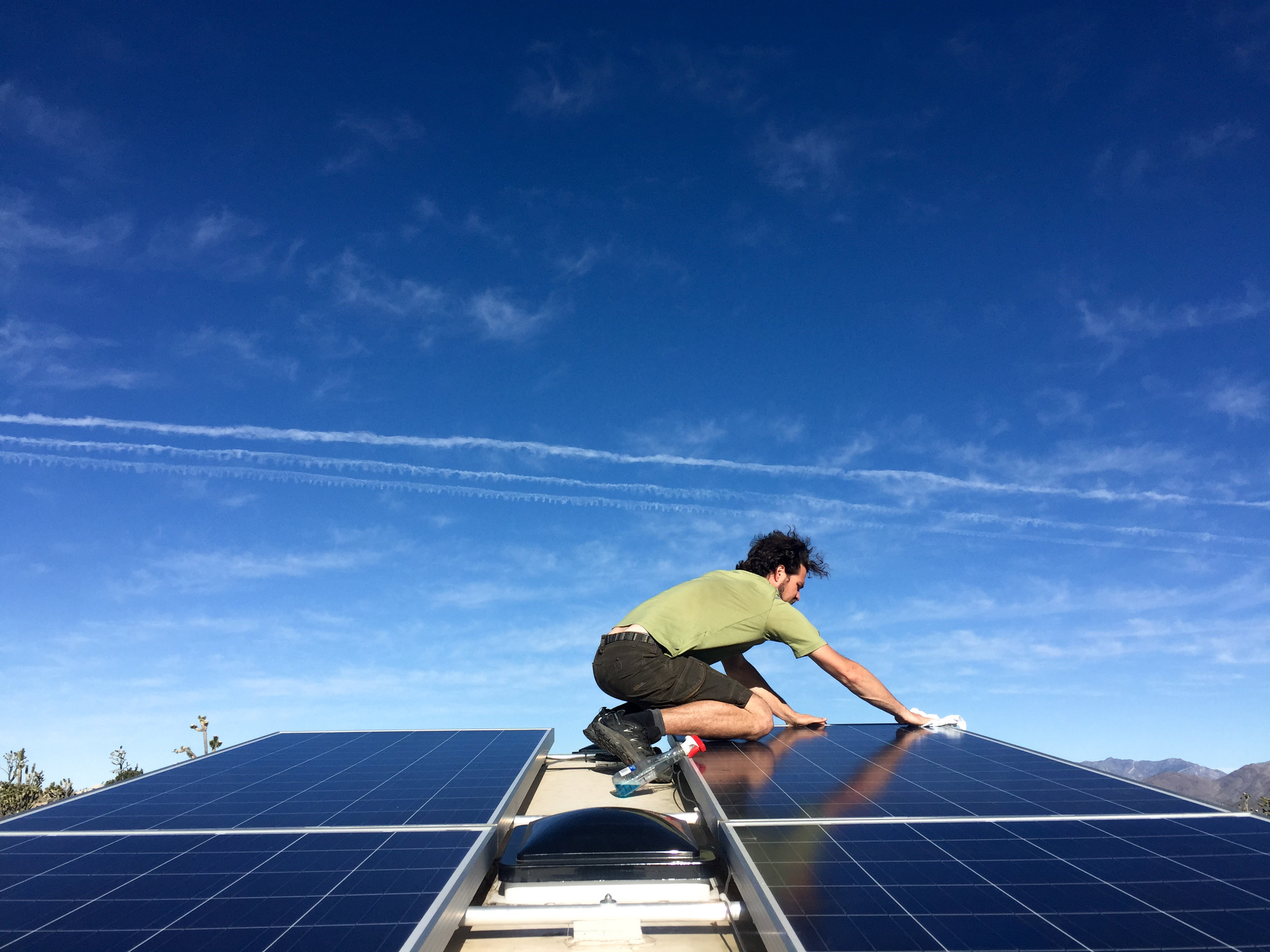 LSRF Jerud cleaning solar panels.jpg