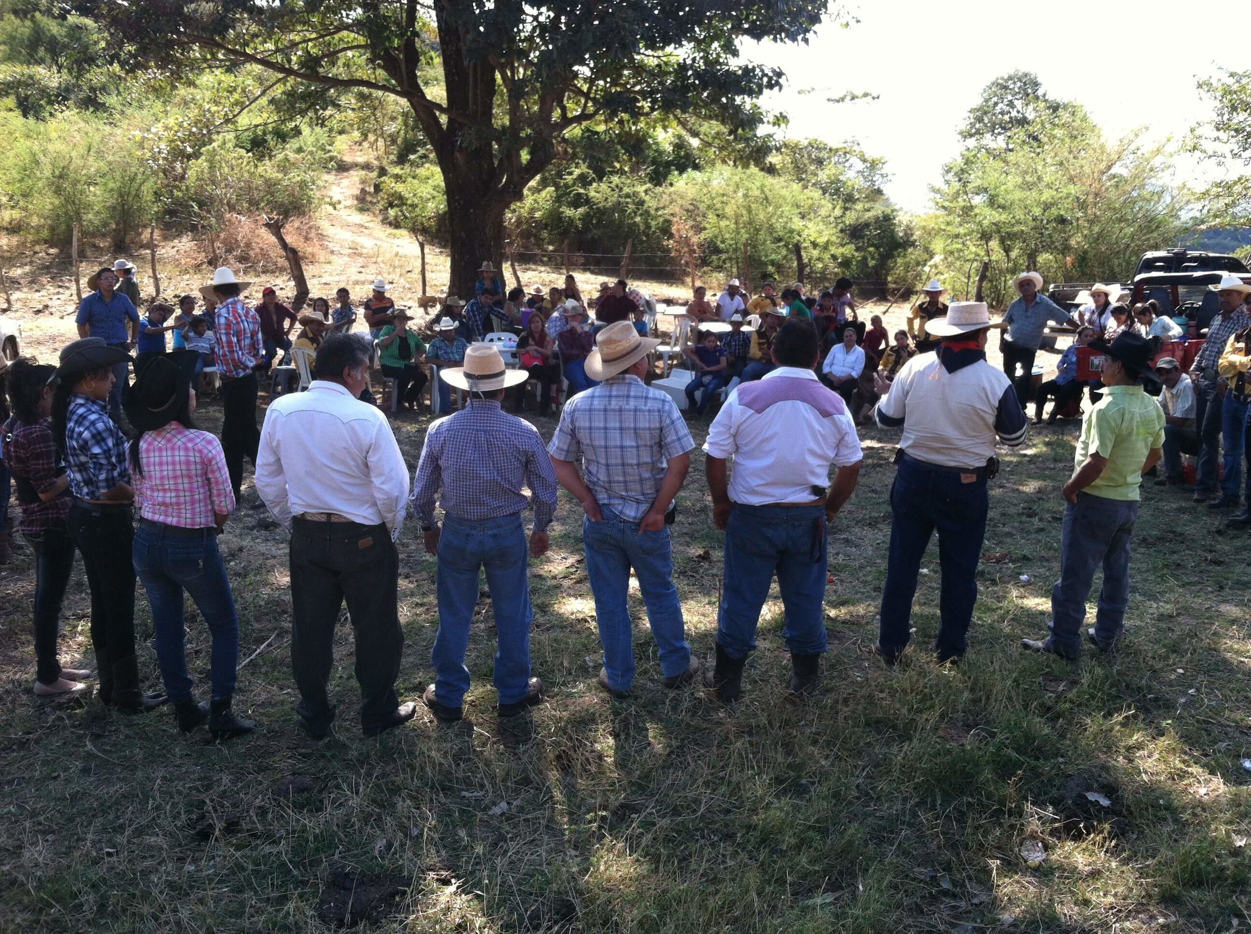 Our first meeting with friends and family of the cattlemen's association in Quesada, Guatemala. Manrique is in the light green shirt and black cowboy hat on the far right. Standing to his left is Cesar Gonzalez. 