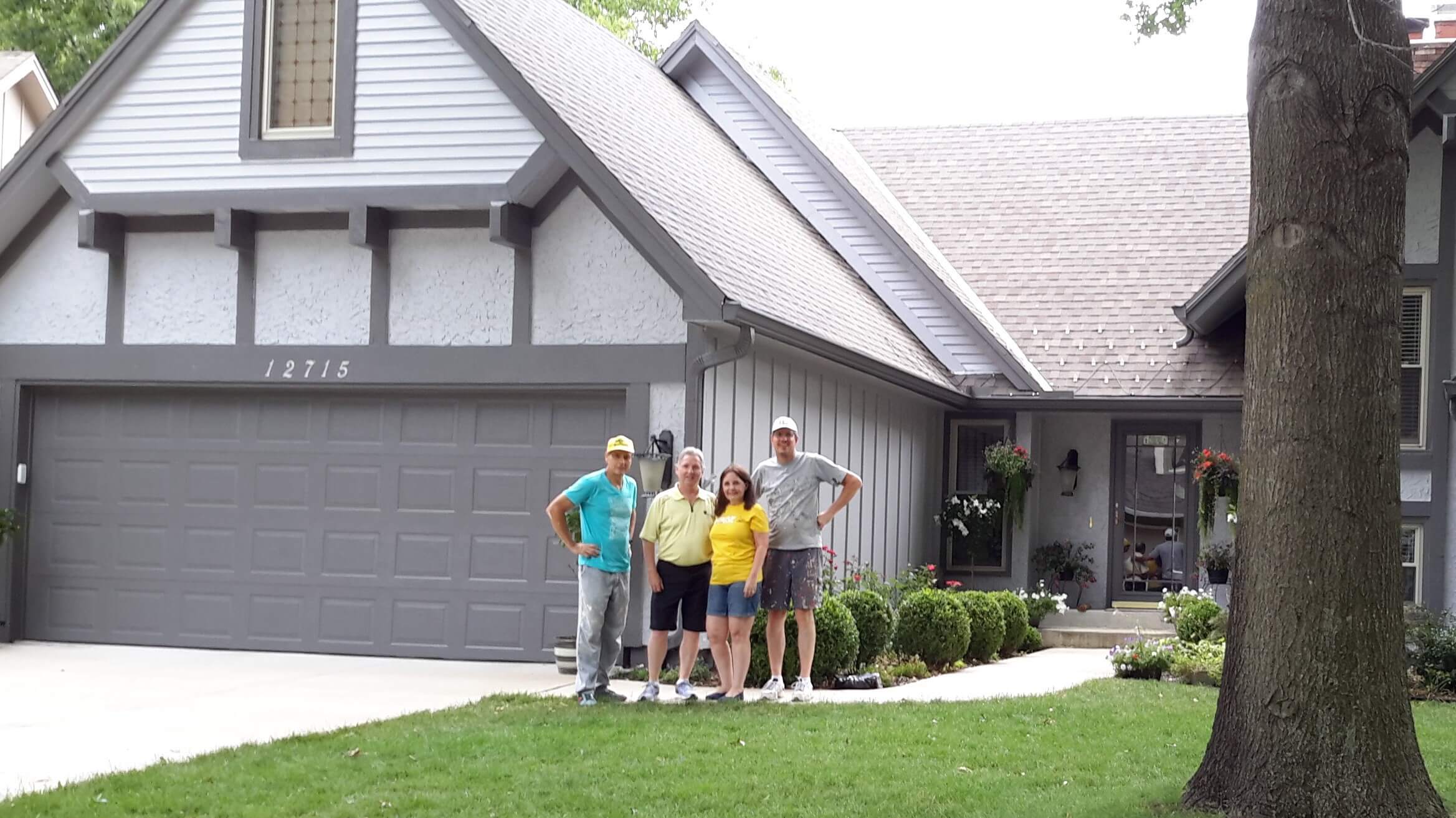 Steve and Bill with Mike and Roxanne Mathis after painting their house last week to help fund upcoming mission trips