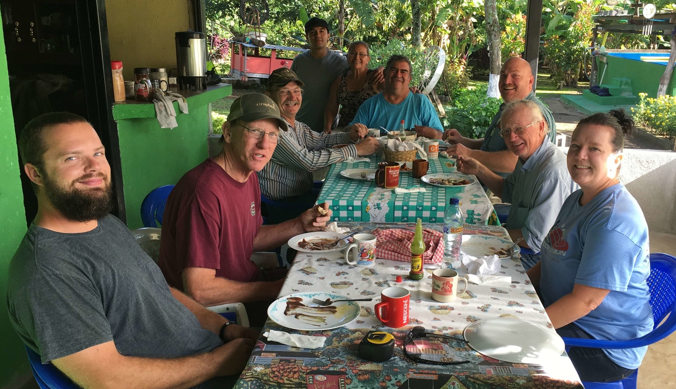 Pictured around the table with Cesar and Elba Gonzalez is the construction team from Second Baptist Springfield and First Baptist Avilla, Missouri. 