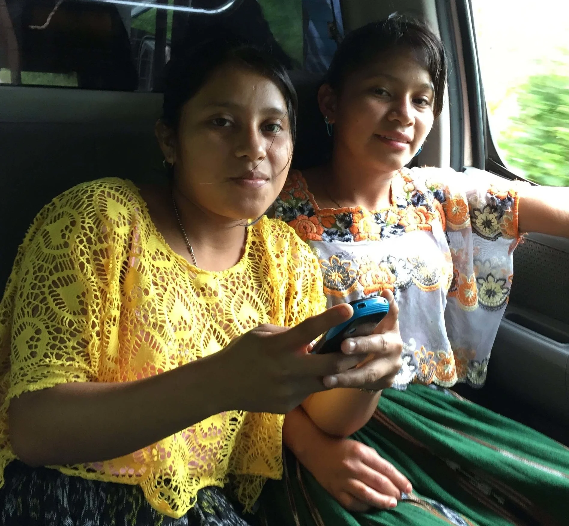 I took this picture last year of these Kekchi teens using their family cell phone to entertain themselves. These girls were taking pictures of what we were doing and showing their friends!