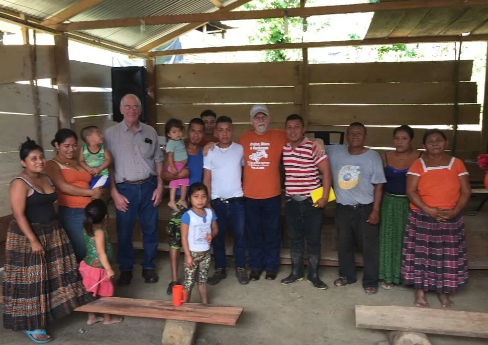 Rex Kelley and Ray Gurney pose with the nucleus of a new church in the jungle. The pastor is not pictured here, but in private he told me that he was seriously considering joining a family member in the U.S. working on a roofing crew. Please pray the pastor stays to lead this flock!