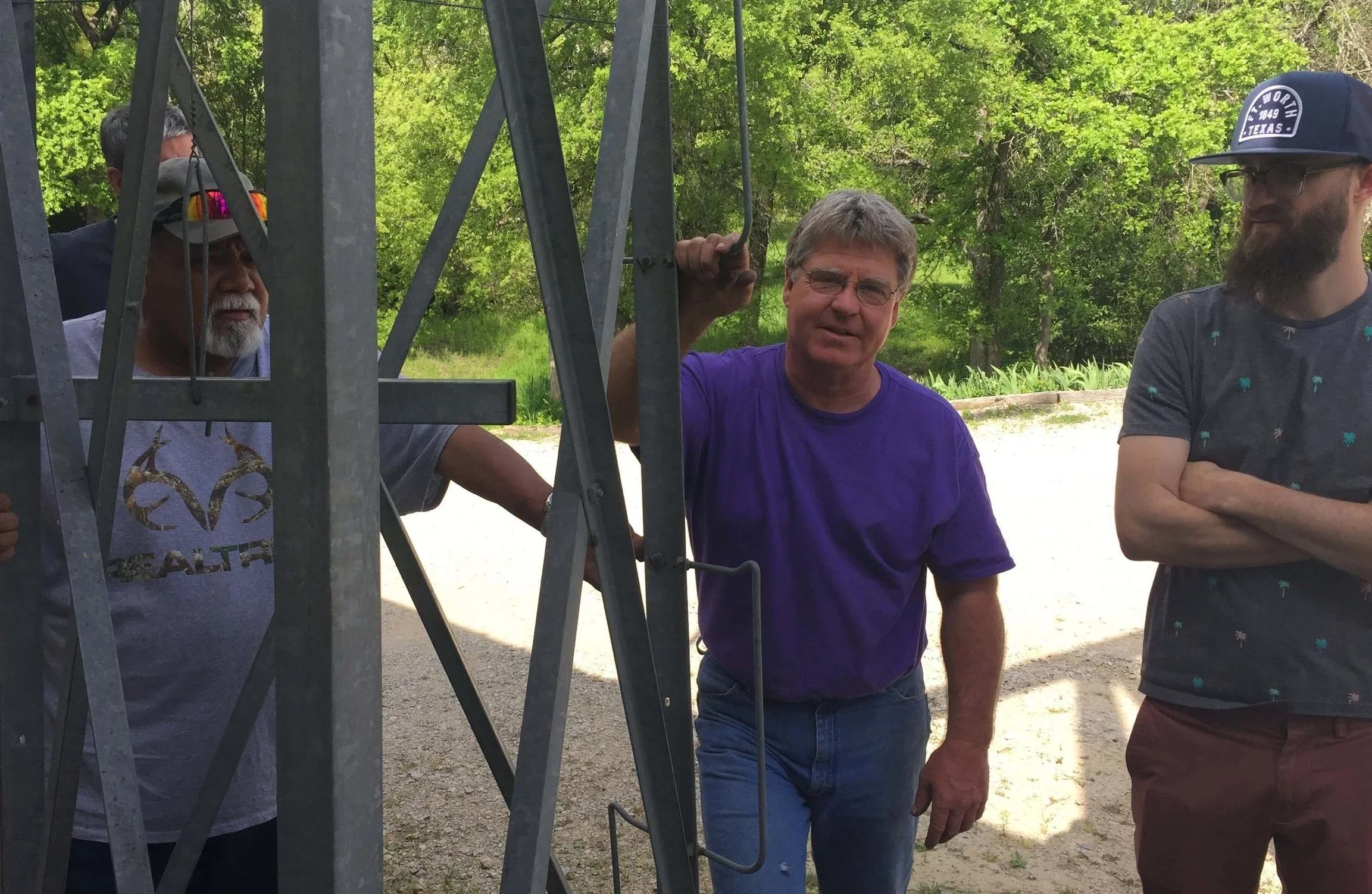 Mark Welch (center) explains how his windmills work. Frank Milano (left) and Tim Tucker (right) look on. When Mark was in Guatemala last year, ranchers were intrigued by Mark’s windmill experience and are asking him to help them figure out if windmills would be practical for watering their cattle.
