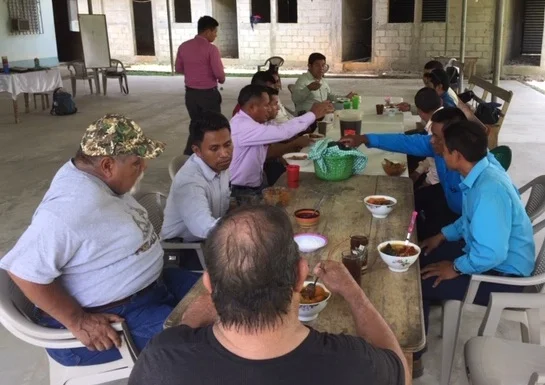 Sitting down to eat with the pastors, they had no problems with this part of the training!