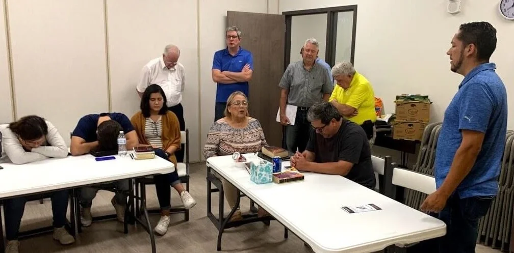 At the Monday training, we prayed before dividing the group up into English speakers and Spanish.