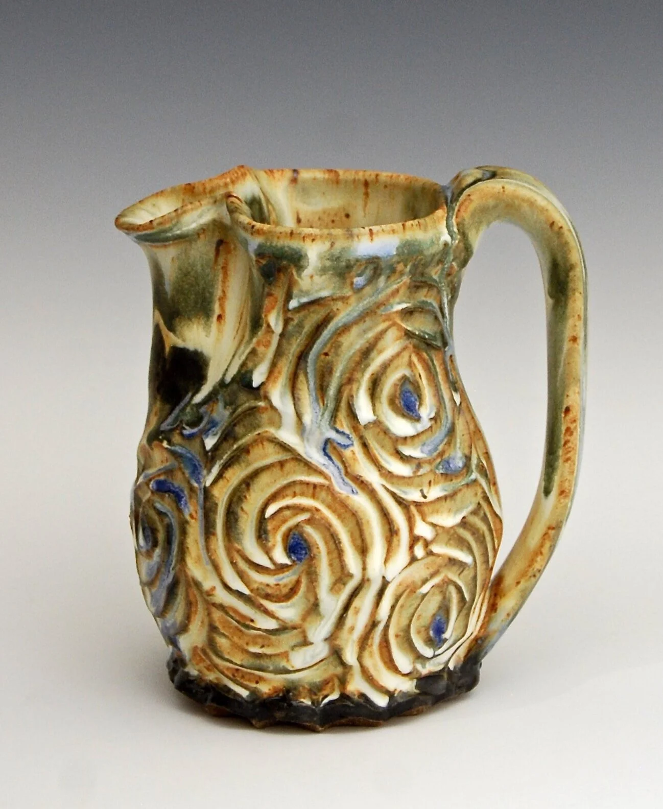 Carved Pitcher