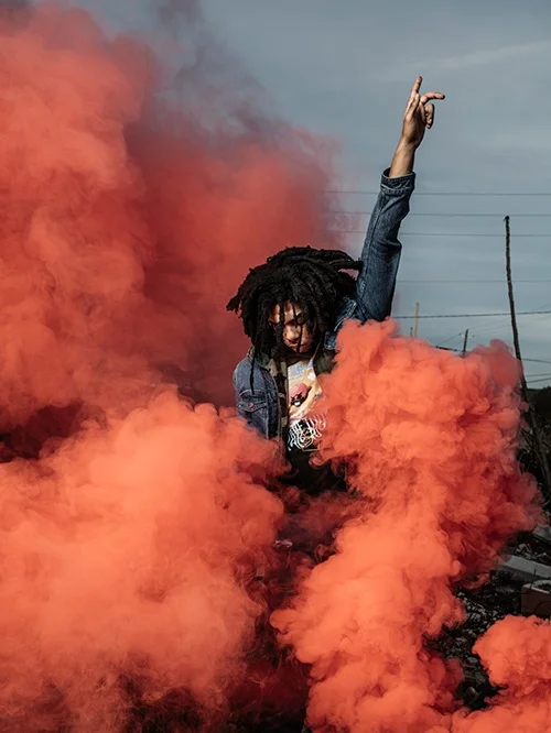 Hip Hop Artist Bob Lennon , Matt Odom, 2018 “This portrait is from an assignment for Macon Magazine. I decided to put together a shoot that encompasses Bob's attitude and overall look. After hearing his remarkable story I decided upon photographing a look that was similar to that of a phoenix rising.” -M.O.