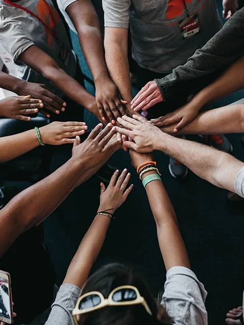 Better Together , Camylla Battani, 2018 “This was our team huddle at church before VBS 2018. I believe that we can make a bigger difference in our community when we all work together despite our differences. I loved seeing all the skin tones represented in one photo and I thought that was the perfect picture of what Macon is like.” -C.B.