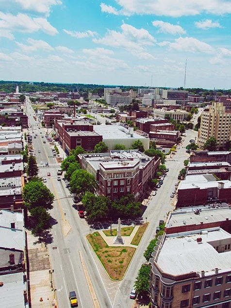 Unity Town , Jessica Whitley, 2015 “ Unity Town was taken in August 2015 in Macon, while walking around the top of one of the tallest buildings in the city, in the search of beauty in the multi-varied infrastructure. Life and vitality naturally interweave within the downtown composition, so I wanted to show it in a way that showed how it works together. I then stumbled upon a birds-eye point-of-view that showed me a city of hope, unity and promise. I had found what I was looking for — a town unified by its skyline, infrastructure and the people that live here who effortlessly revive it daily.” -J.W.