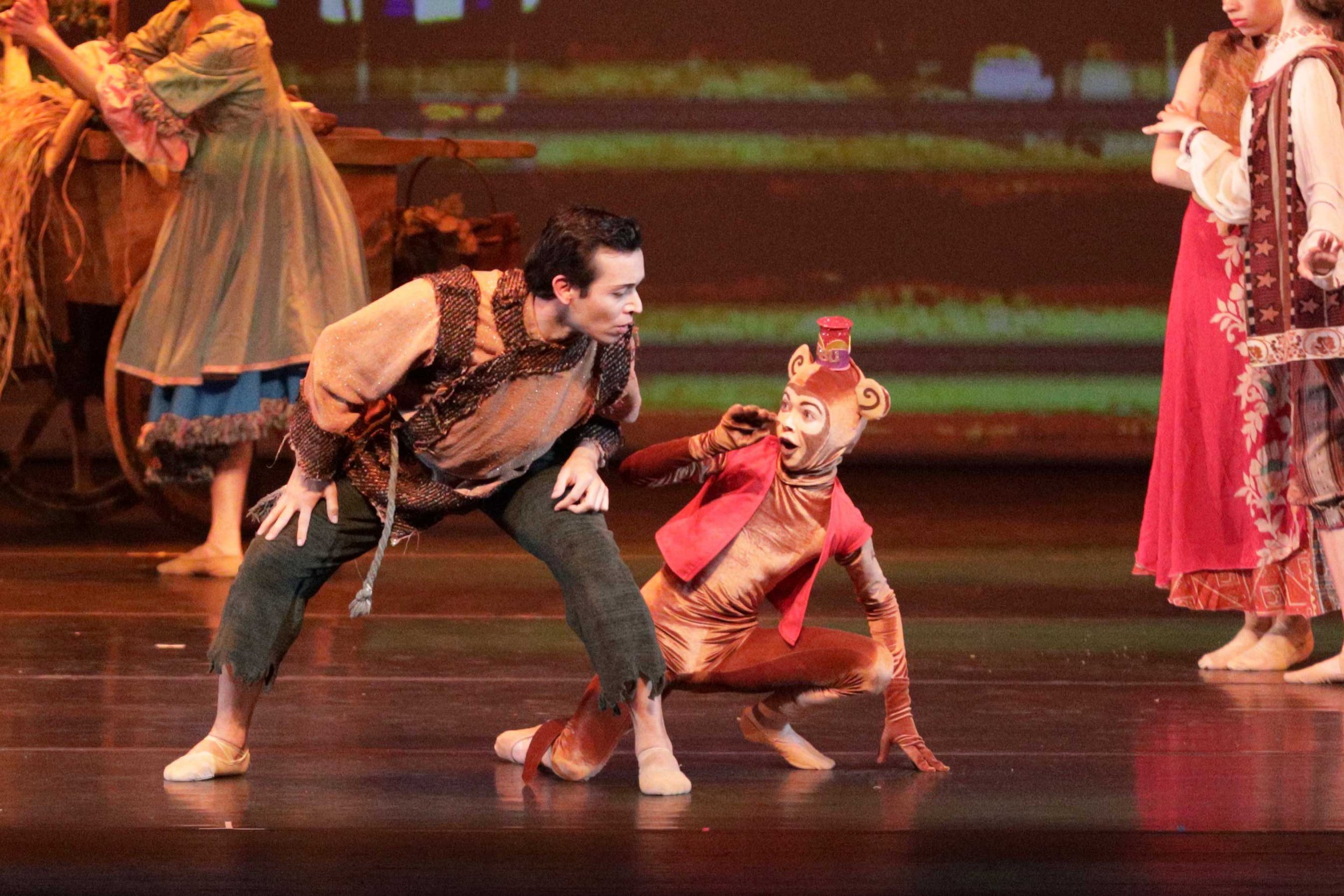 On the streets of Agrabah, a poor young street urchin named Aladdin is struggling to steal some food, along with his pet monkey, Abu.