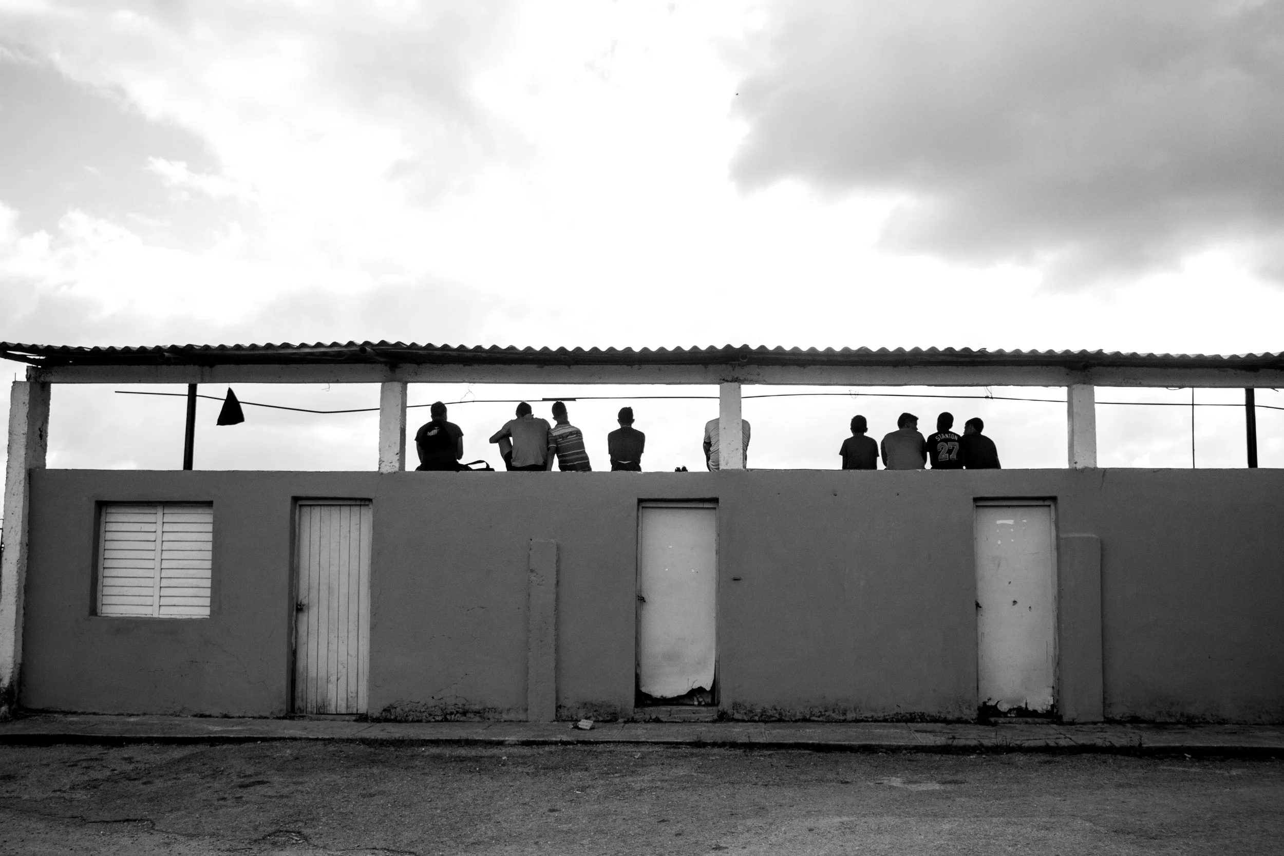 Spectators at the local baseball diamond in Viñales