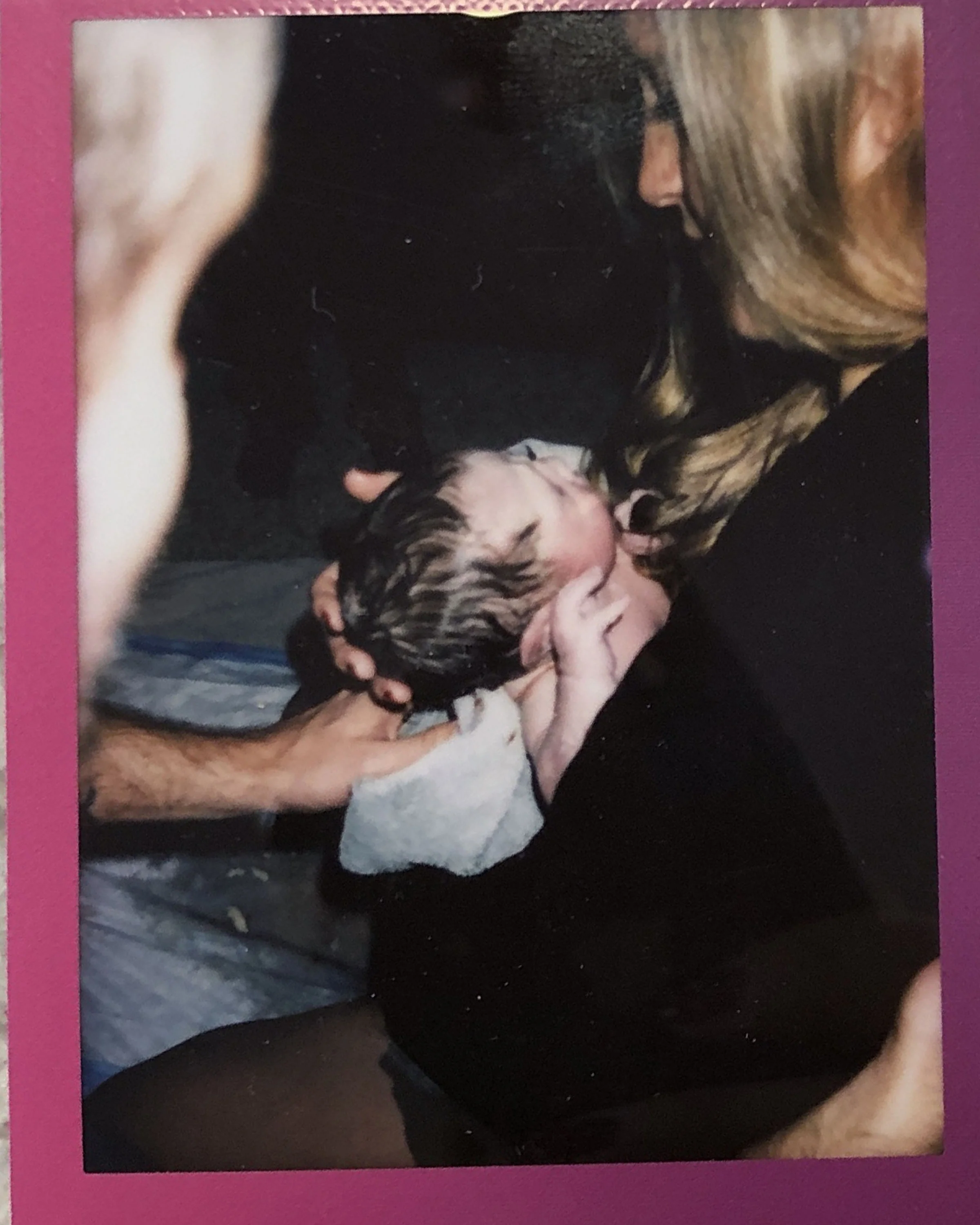 Aiden’s polaroid shot from the birth that he was taking in the photo from above!