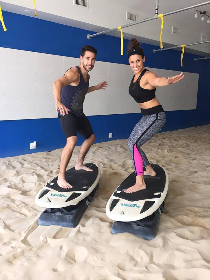 Instructor Quinn and I using our core to balance!
