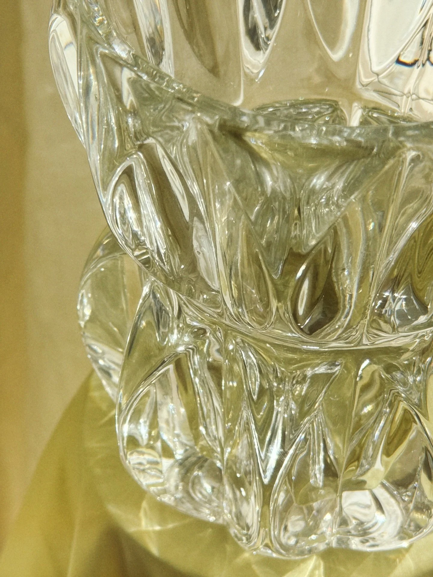 SOLD // Vintage 90&rsquo;s Crystal Glass Vase
Heavy Dense Glass With Geometric Tear Drop Cutouts That Catches All Of The Right Light; A Squatty Wide Take On the 60&rsquo;s Pattern #974 by Jan Schmid for Sklo Union