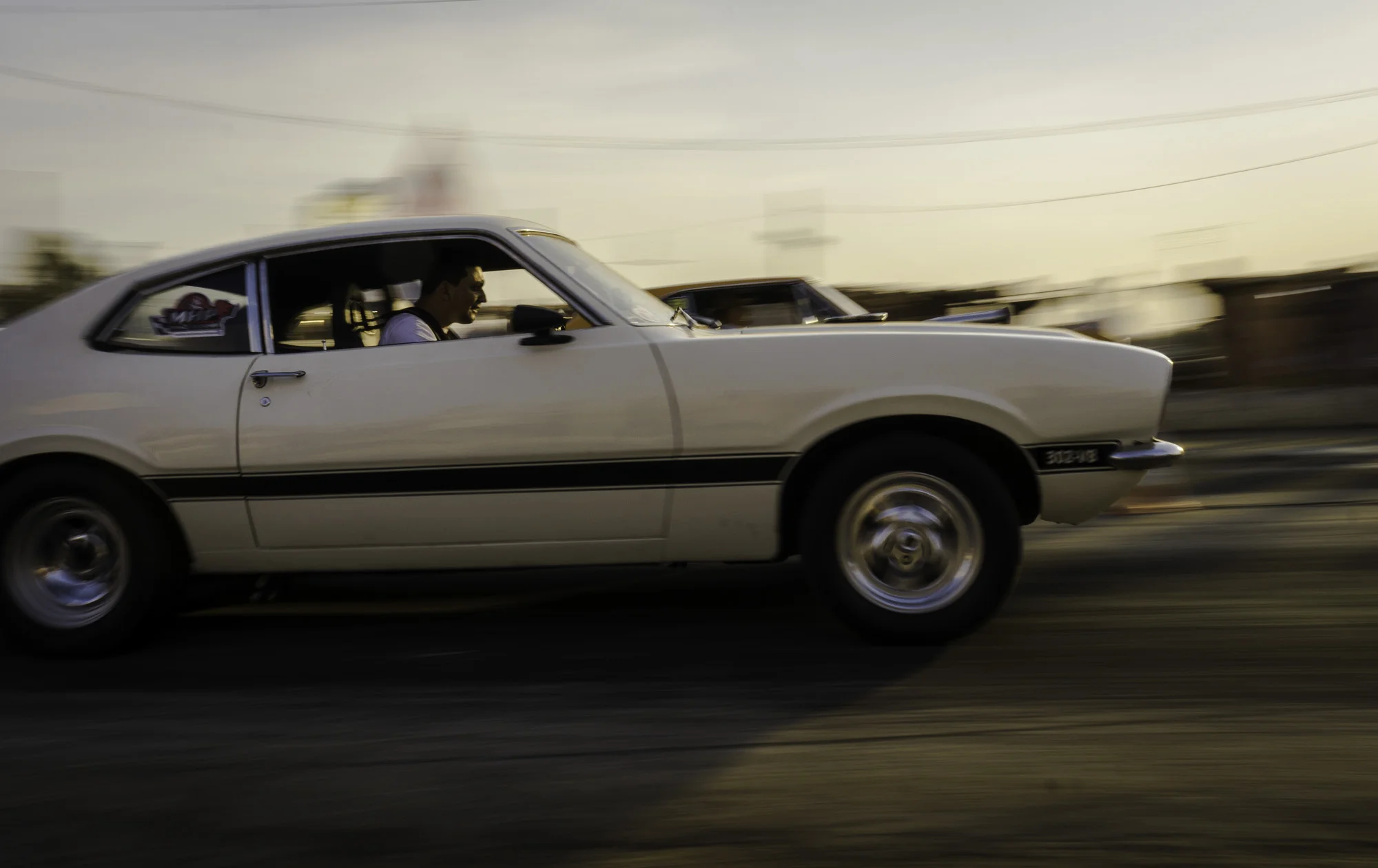 A Ford Mustang launching for a drag race