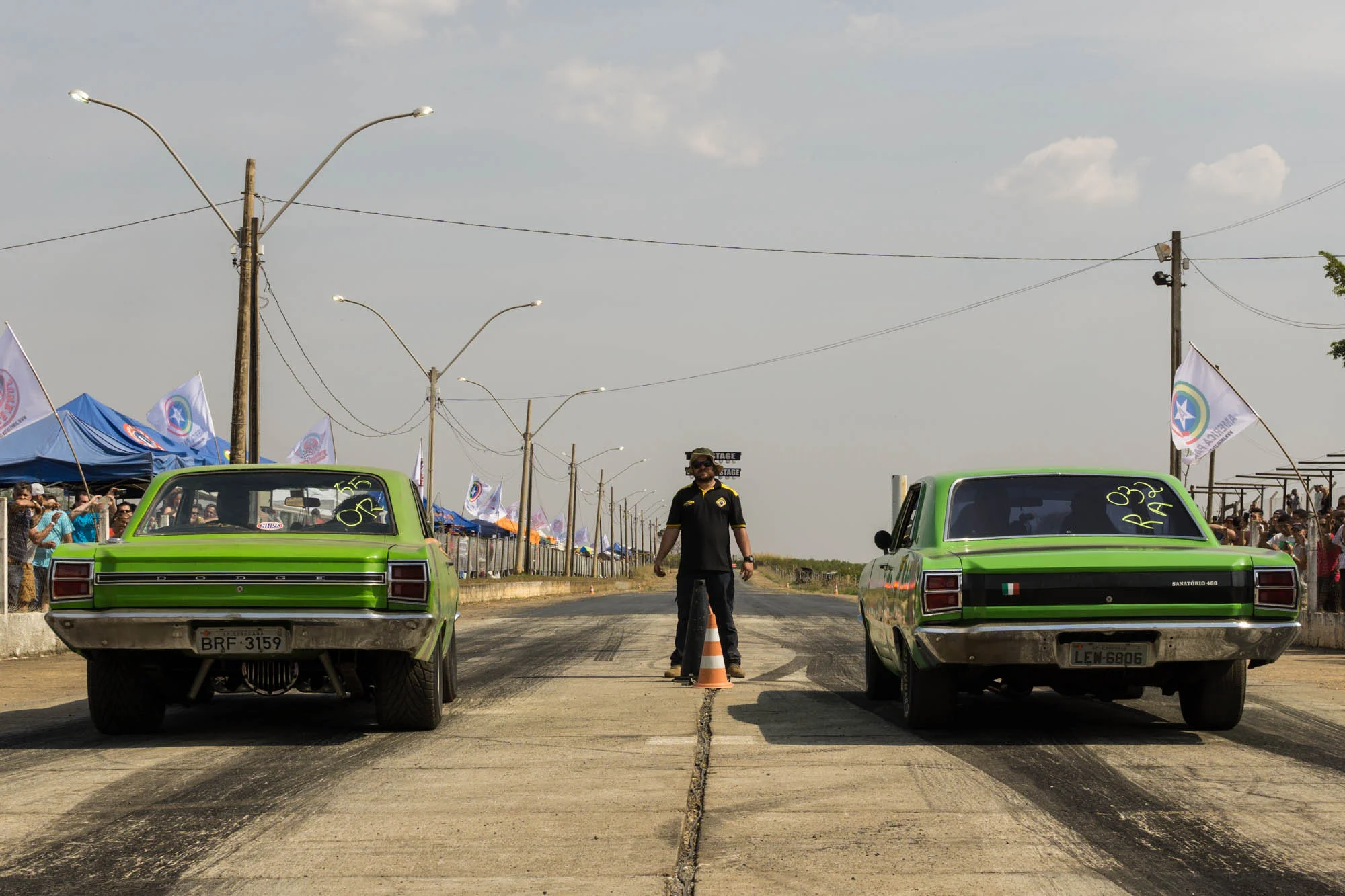 Two Cars waiting to start a Drag Race