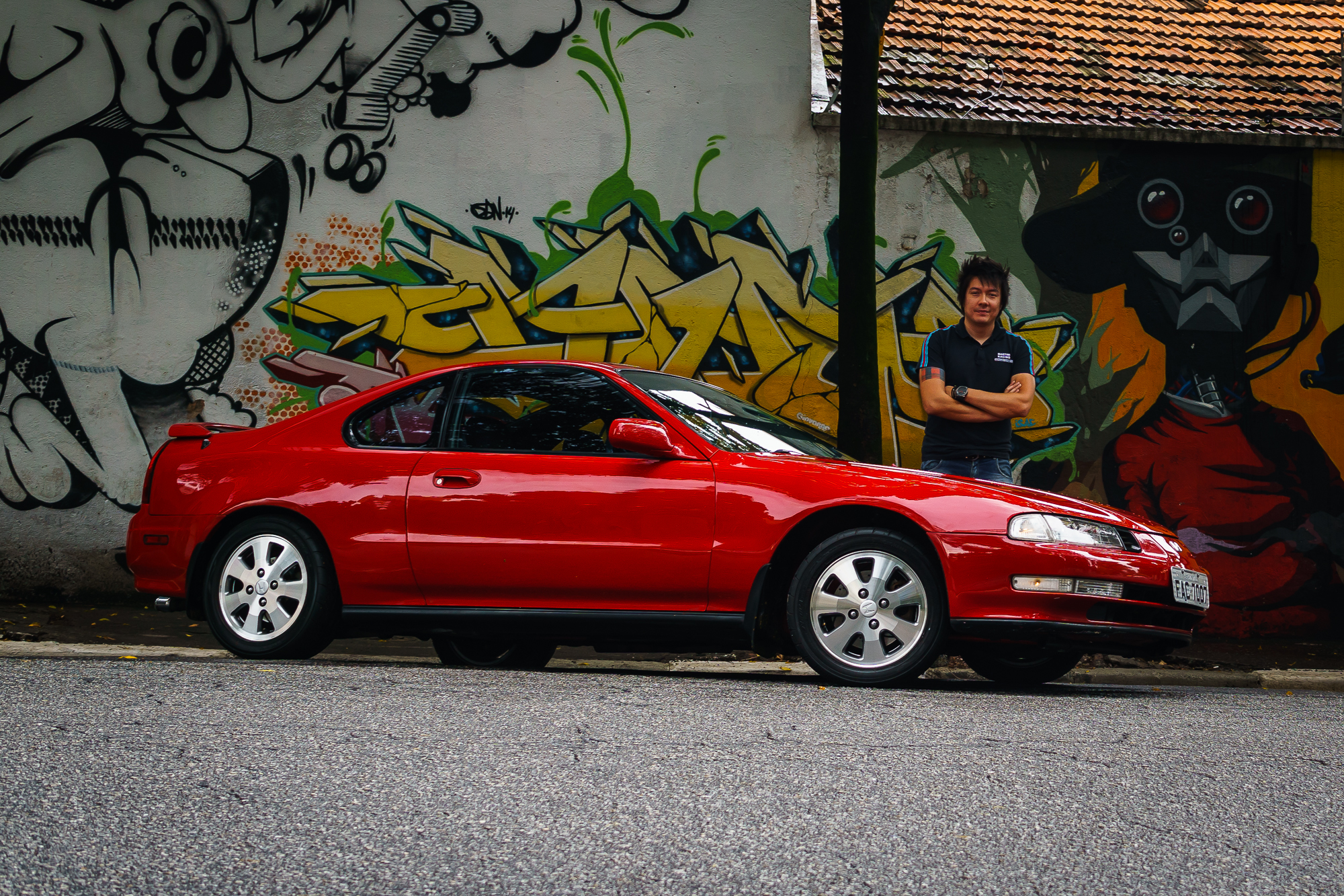Juliano standing behind his Prelude