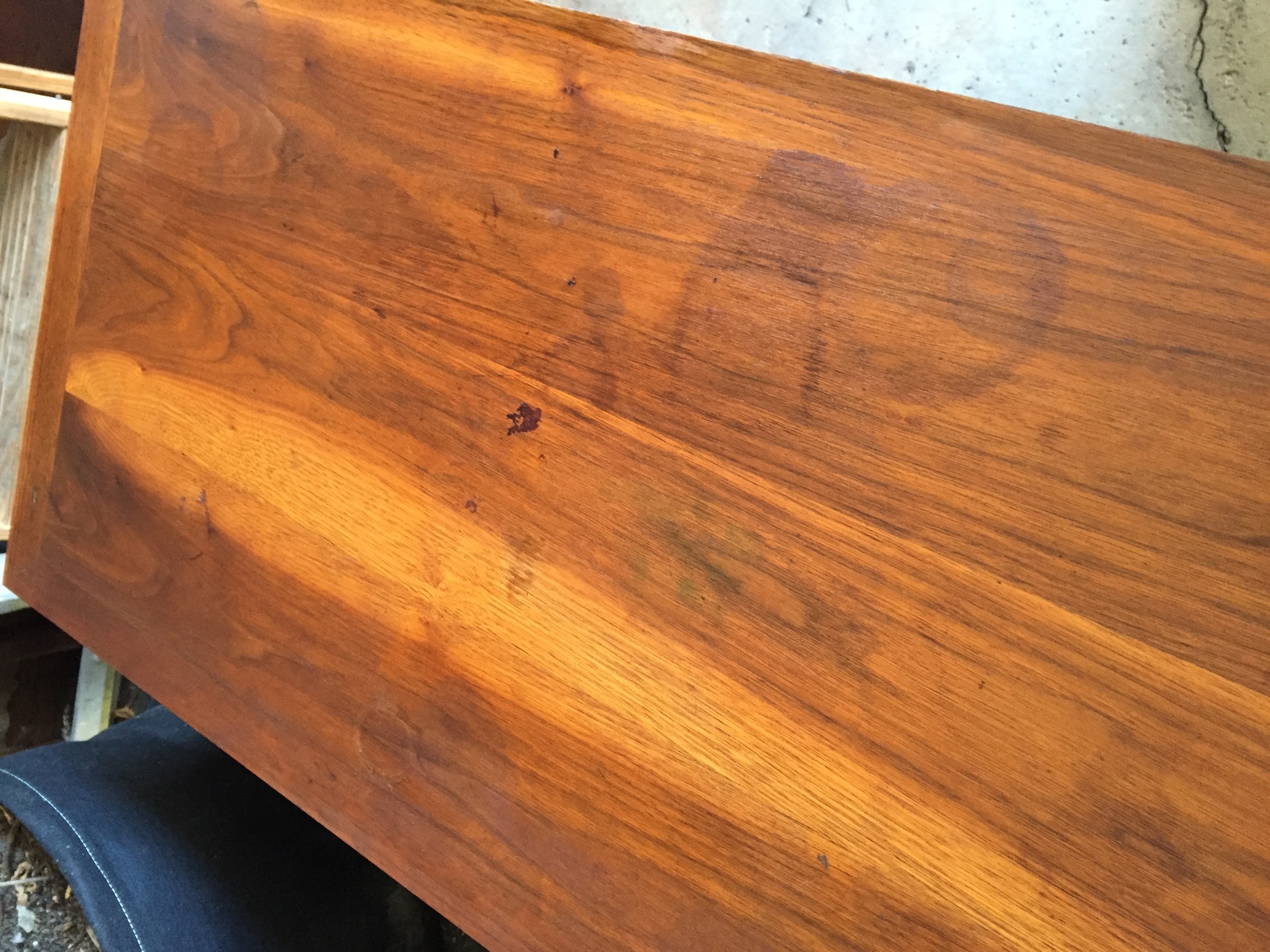 Unfortunately, on the other end of that dresser is a lot of water and other types of damage. This is after scraping stripper off. There's sanding in my future.