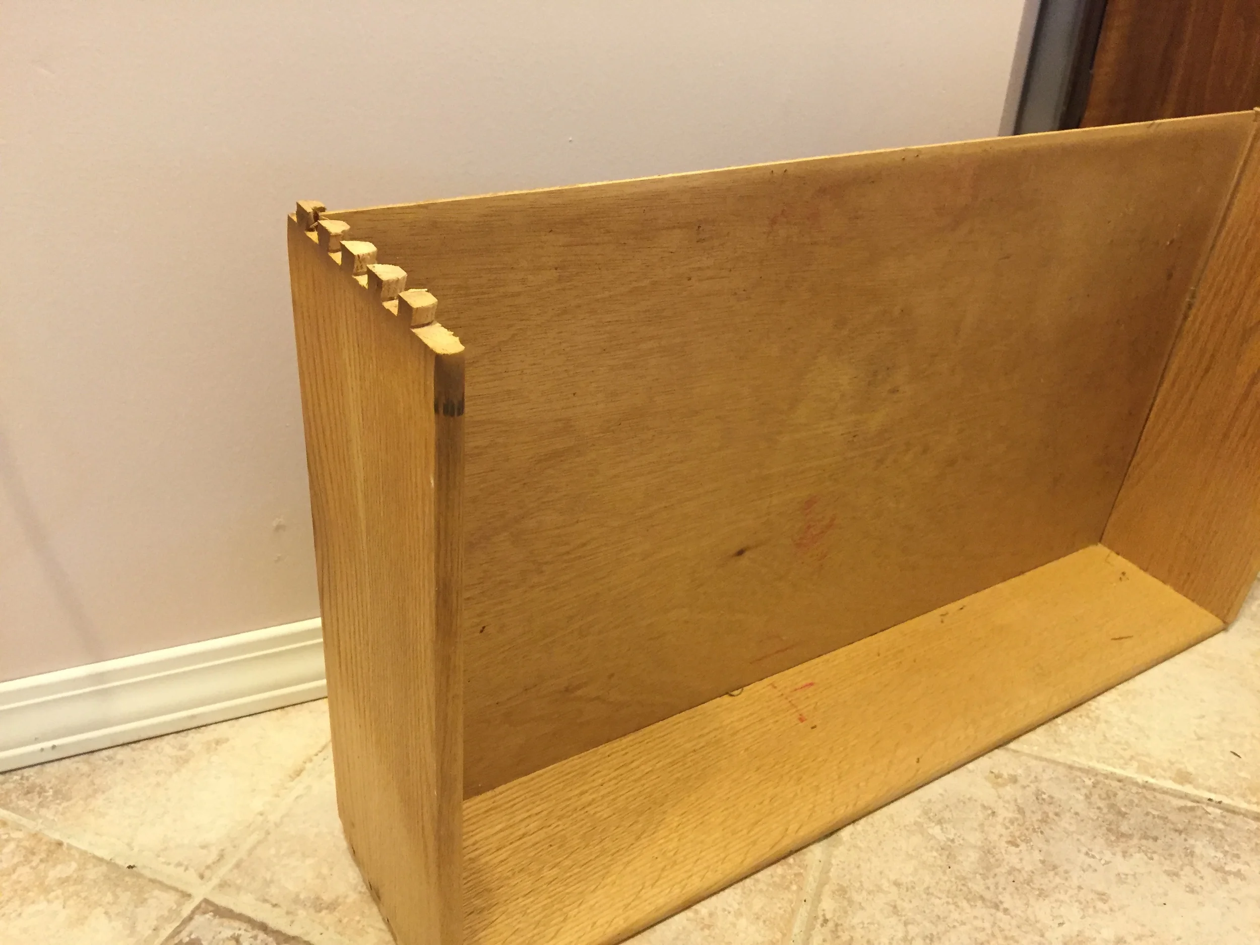 Here's the middle drawer with the front popped out.&nbsp; We need the front to create a faux (that's fancy for "fake" -oooh, so fancy!) drawer.