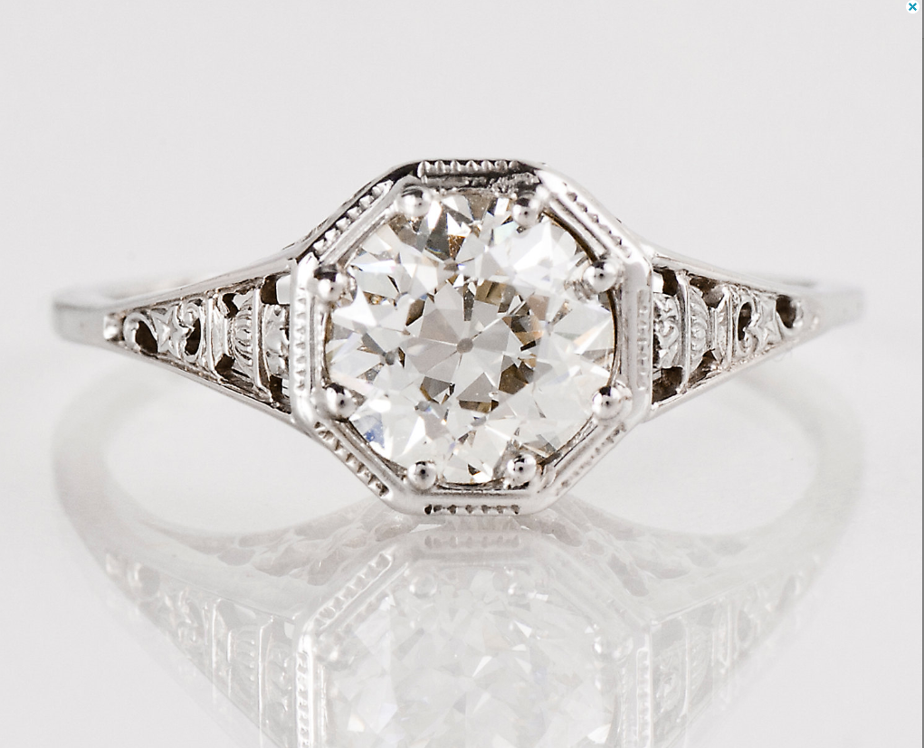 From TheCopperCanary on Etsy - $14,500 - from the 1920s Look at the cool detailing you can see in the reflection of the side profile of the ring. So pretty!