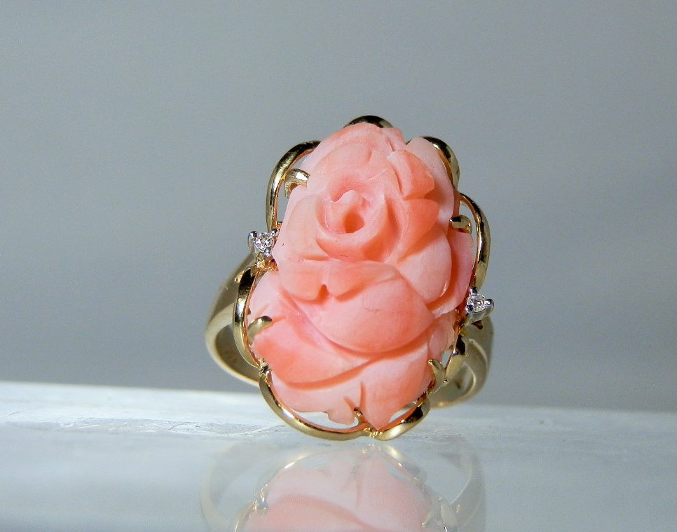 From DanPickedMinerals on Etsy - $251 - from the 1970s, Carved Natural Salmon Coral and diamonds