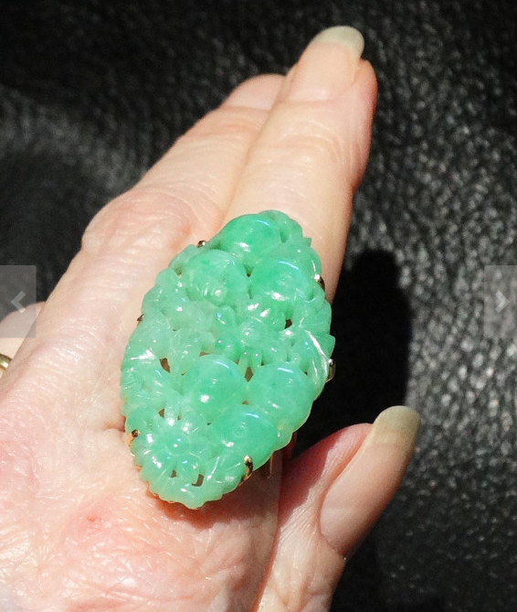 From ElegantArtifacts on Etsy - $1250 - from the 1900-1909, Jade Okay, so whatever, it doesn't look like an engagment ring, but I would totally say "yes" to this one!