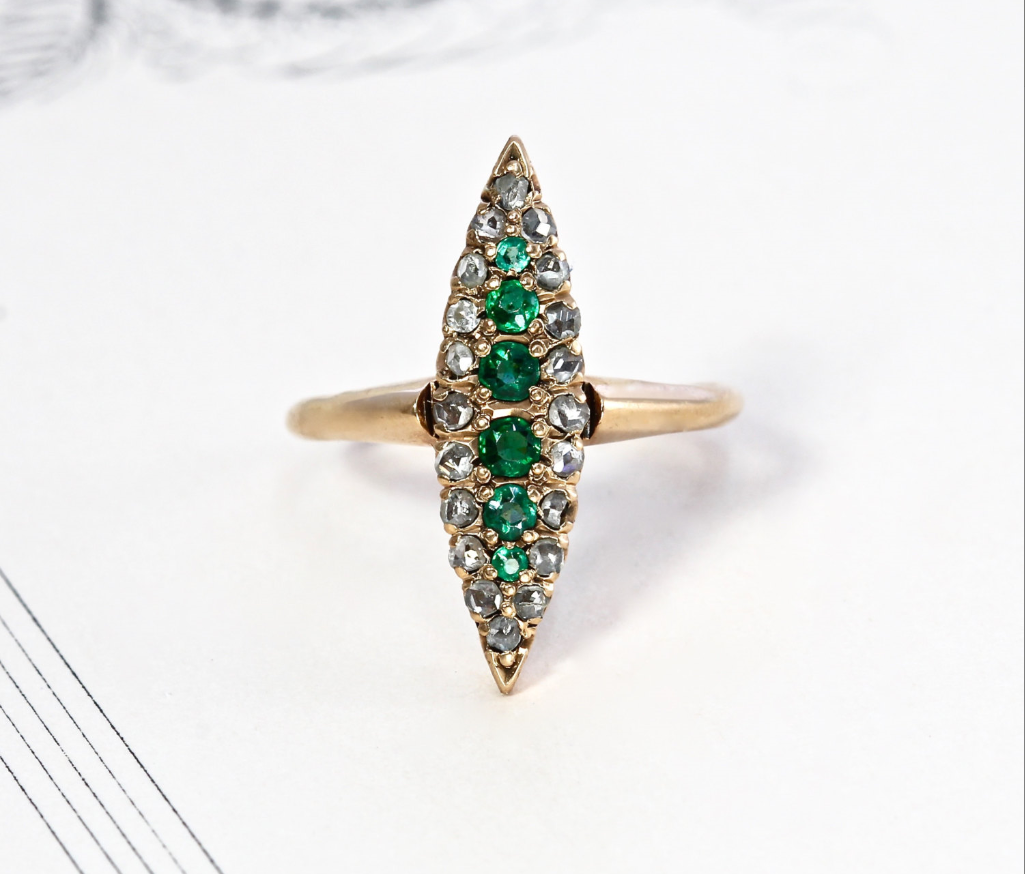 From TheEdenCollective on Etsy - $645 - from the 1800s, Emeralds and Diamonds Drool. And...pretty sure this could be a weapon.