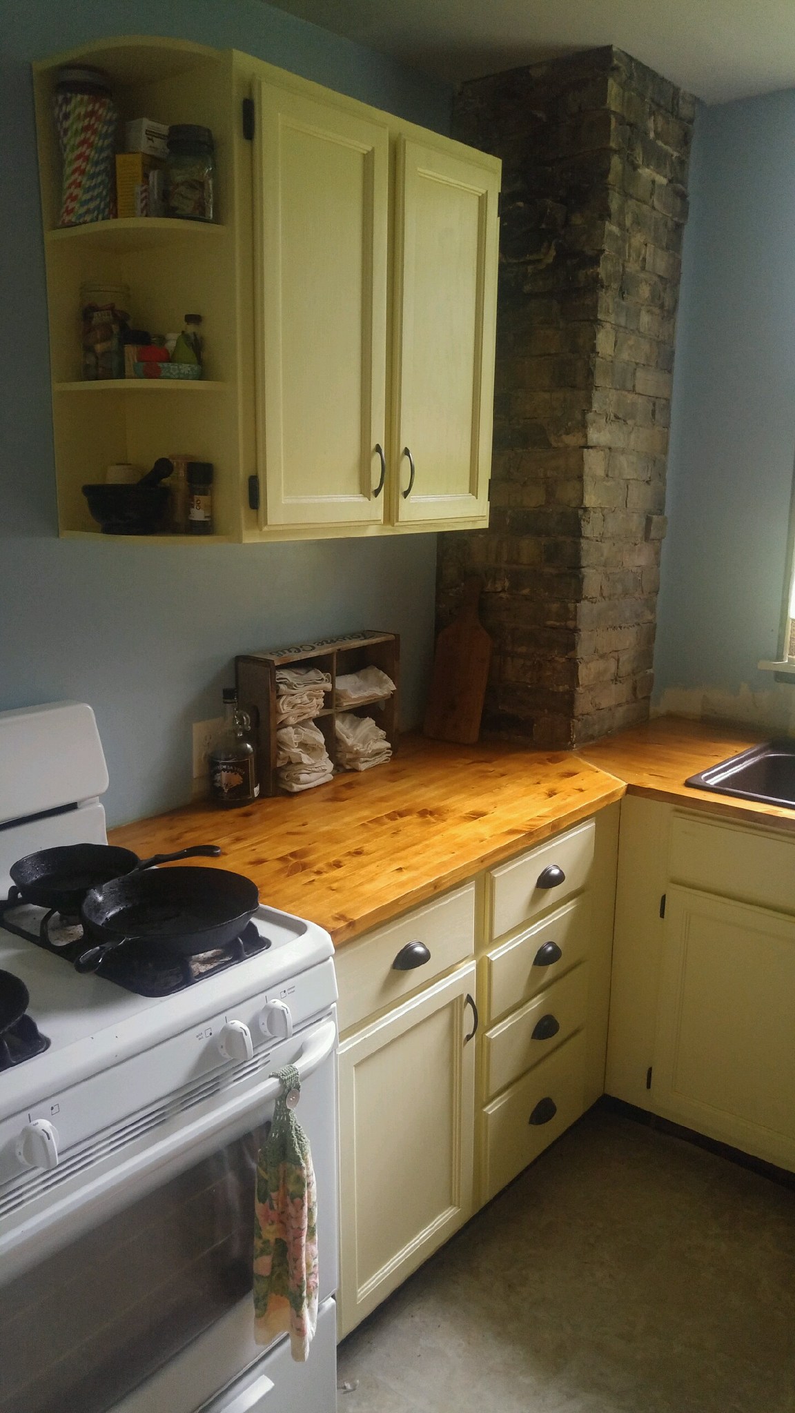 I love the brick in the kitchen!