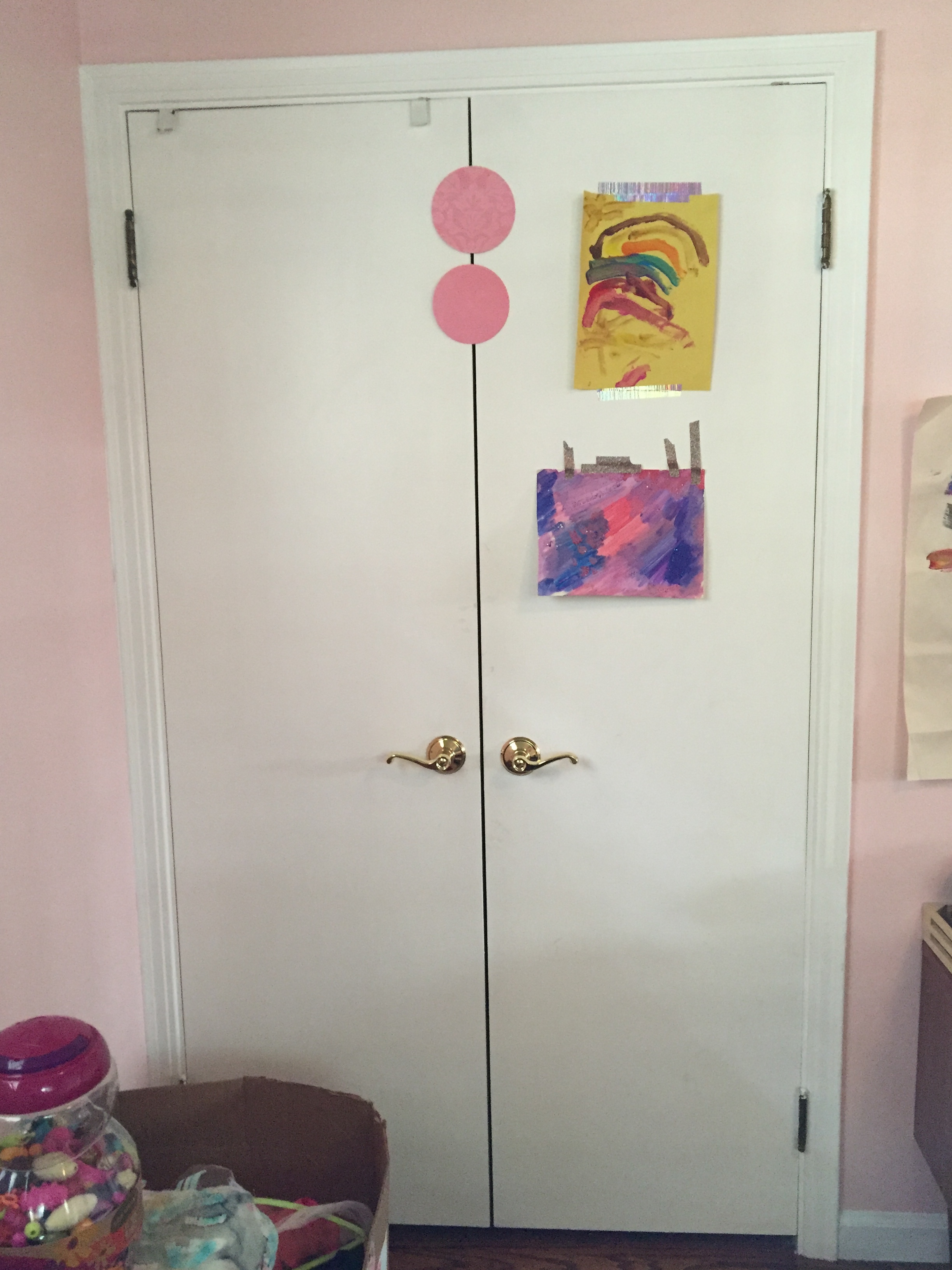 The closet has nothing special inside except for my hubby's and my extra clothes. And the doors just serve as another place to decorate with art.