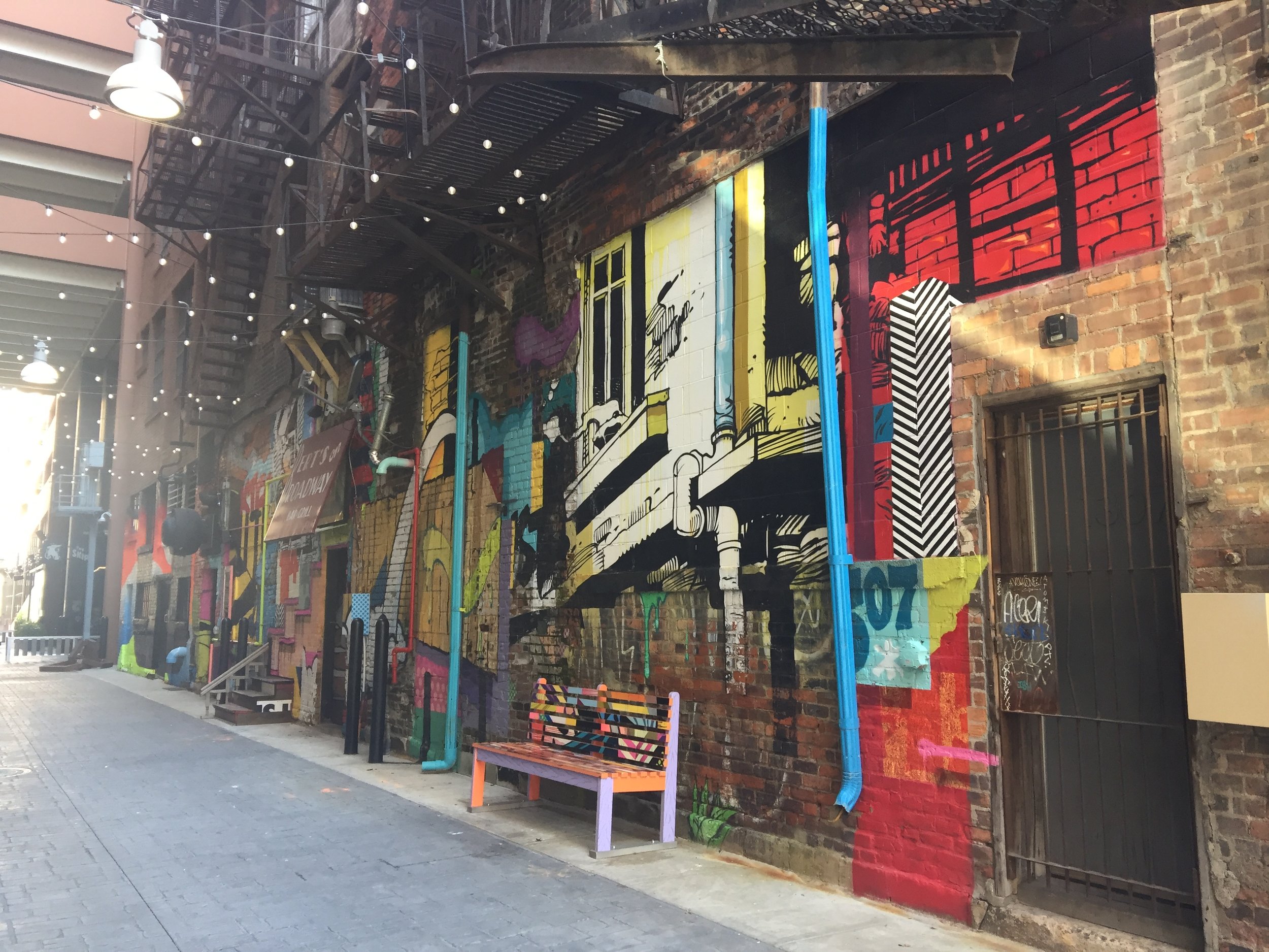 Continuing down the alley....more art