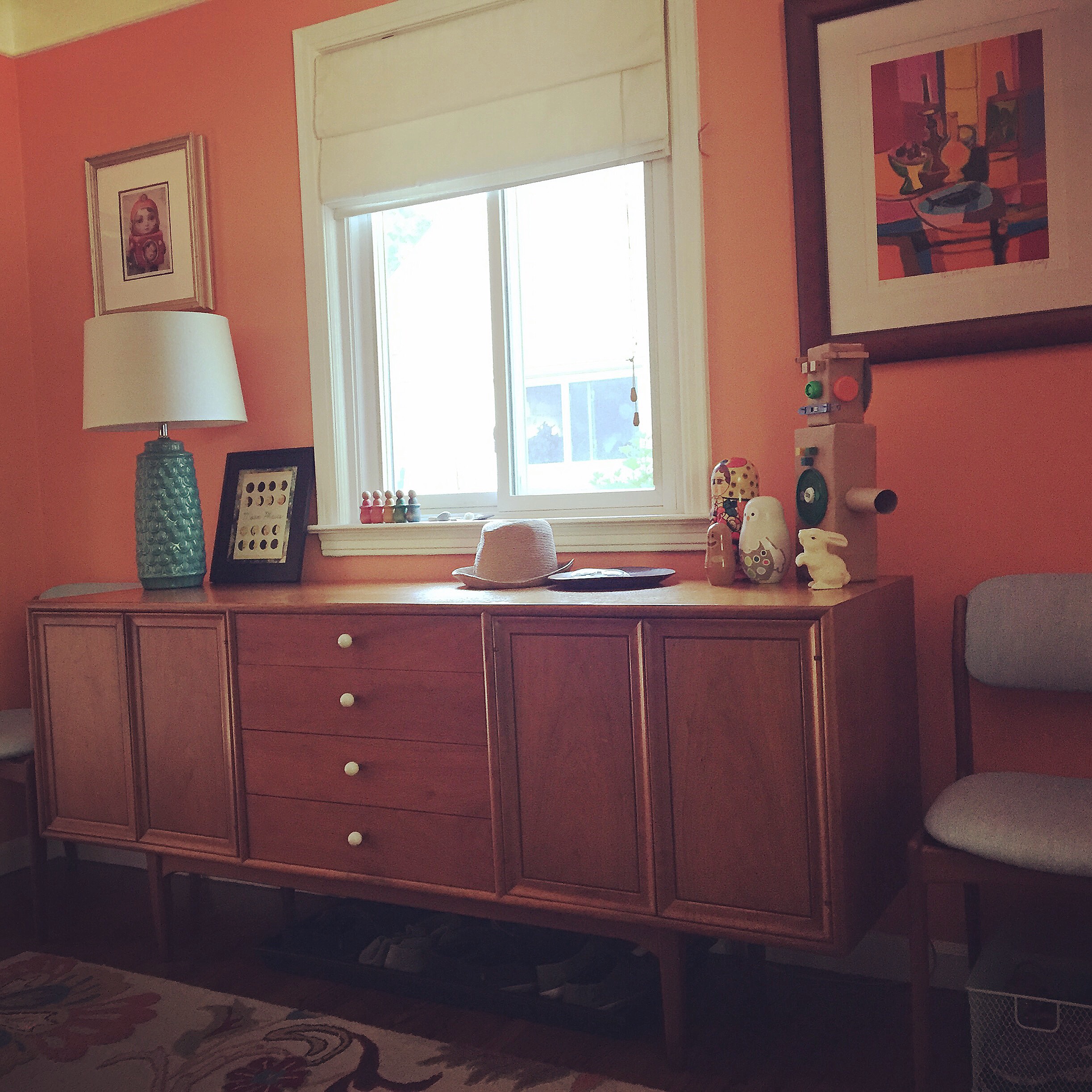 A favorite of mine. We use this one in our entryway. It's a great place to be able to put mail and any other stuff we walk in the front door with, and it stores a ton of the stuff we may need on our way out the door. This comes in super handy because our front closet is TINY.