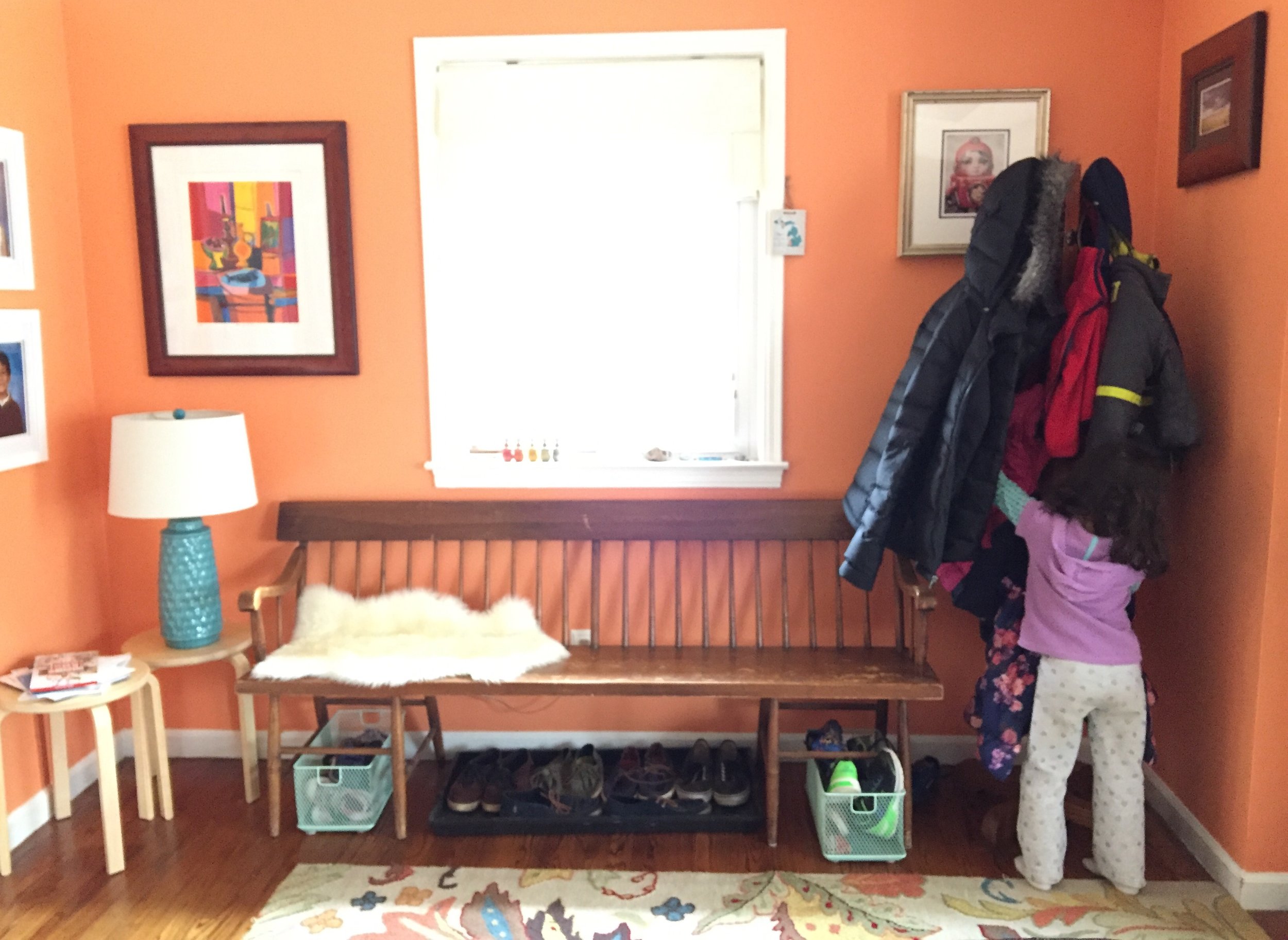 Meena realizes I can outwait her and decides to hang up her coat. The end.