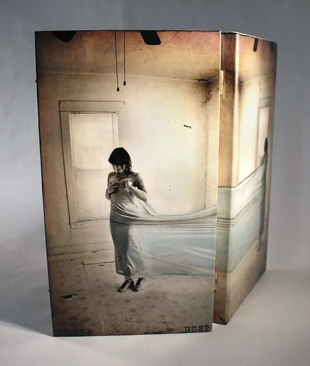 The back, and open so you can see how the image wraps around the spine. 
