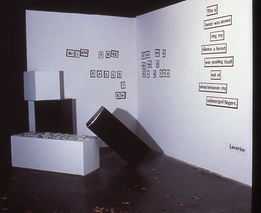 Little nails stuck out of the wall in this corner and also in the corner across the room. Visitors to the gallery were invited to move letter tiles around to create poetry or thoughts of their own.