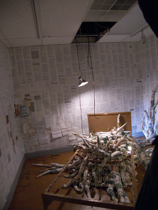 The handwritten, folded papers on the wall are pages written by a Dammasch resident -somebody known as Reverend Bob. The pages contain drawings and statements about redemption and were accordioned then doubled over and wedged into the slats of a radiator. Finding them was like stumbling into a gold mine. 