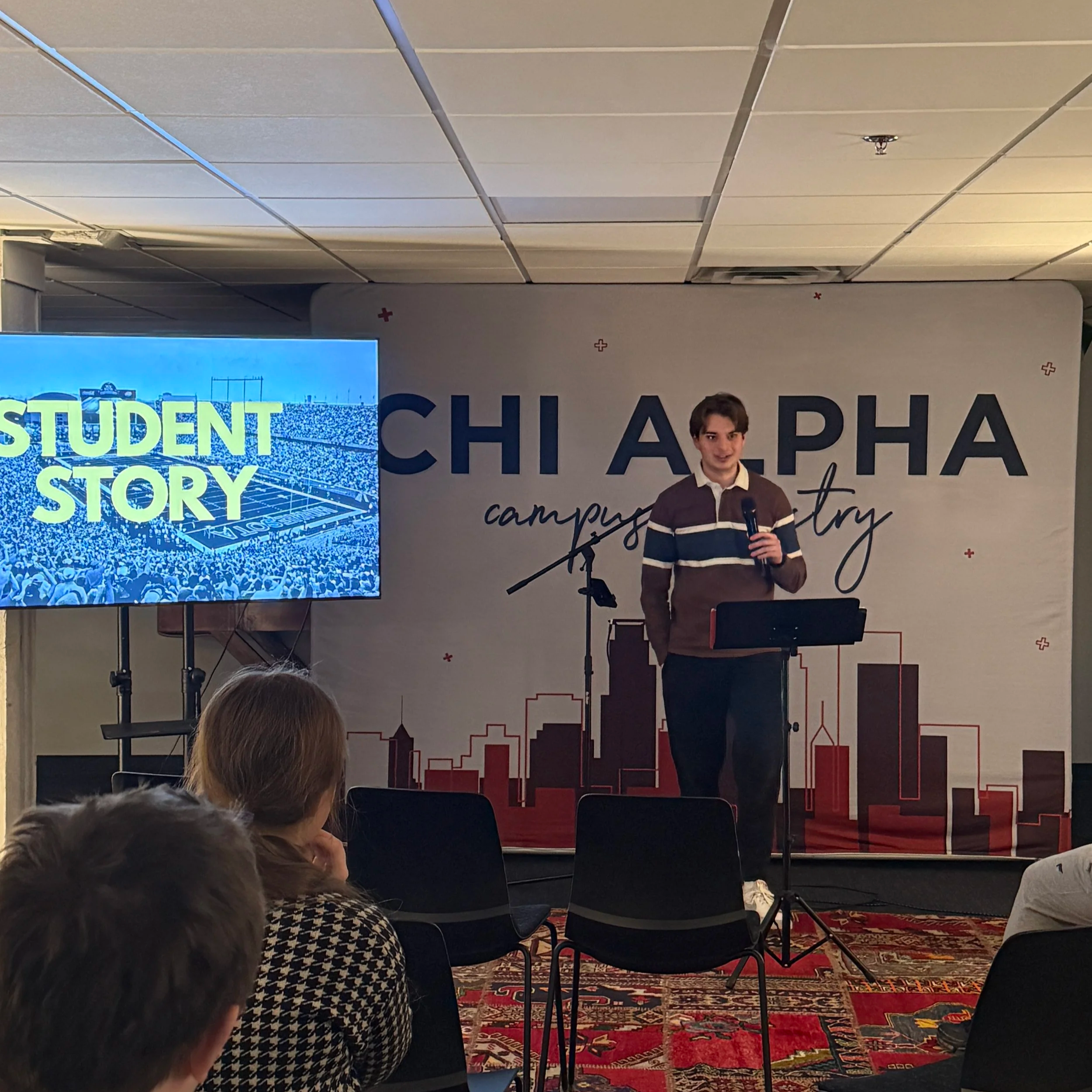 Student preaching at Chi Alpha Rally